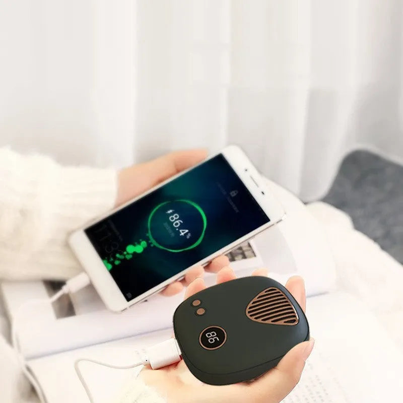 Mini hand warmer in green plastic with modern simple design for USB charging