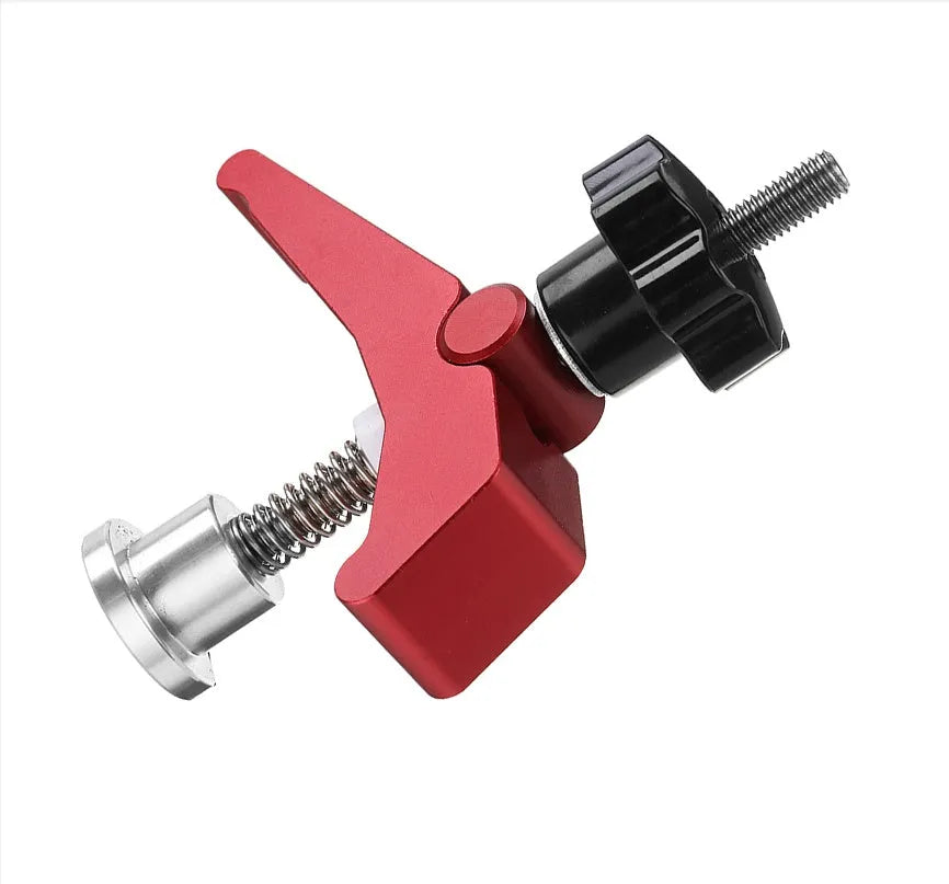 Red aluminium alloy woodworking table block slide holder with a flat mouth and handle.