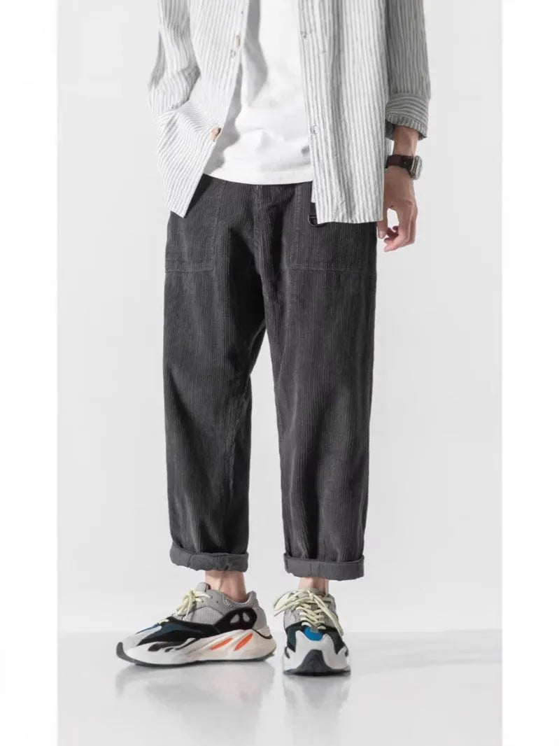 Loose straight tapered pants with wide legs in chemical fibre blend fabric, shown in dark grey colour