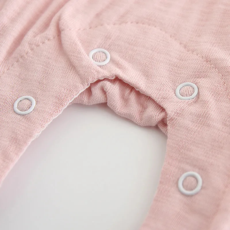 Pink baby girl embroidered long sleeve jumpsuit made from 100% cotton.