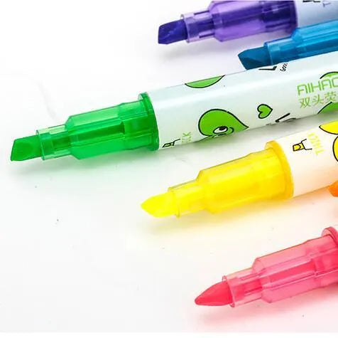 Six double-headed highlighters showing pink, orange, yellow, green, blue, and purple tips, with 15cm body and plug-in design.