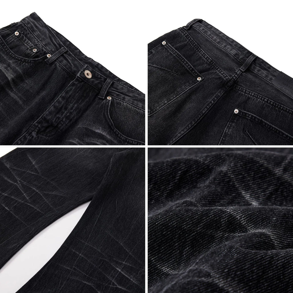 Men's black straight-leg jeans with a distressed lightning crack wash pattern on the legs.