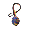 EVA floating pet training ball in camouflage colour showing tetherball design with knot attachment
