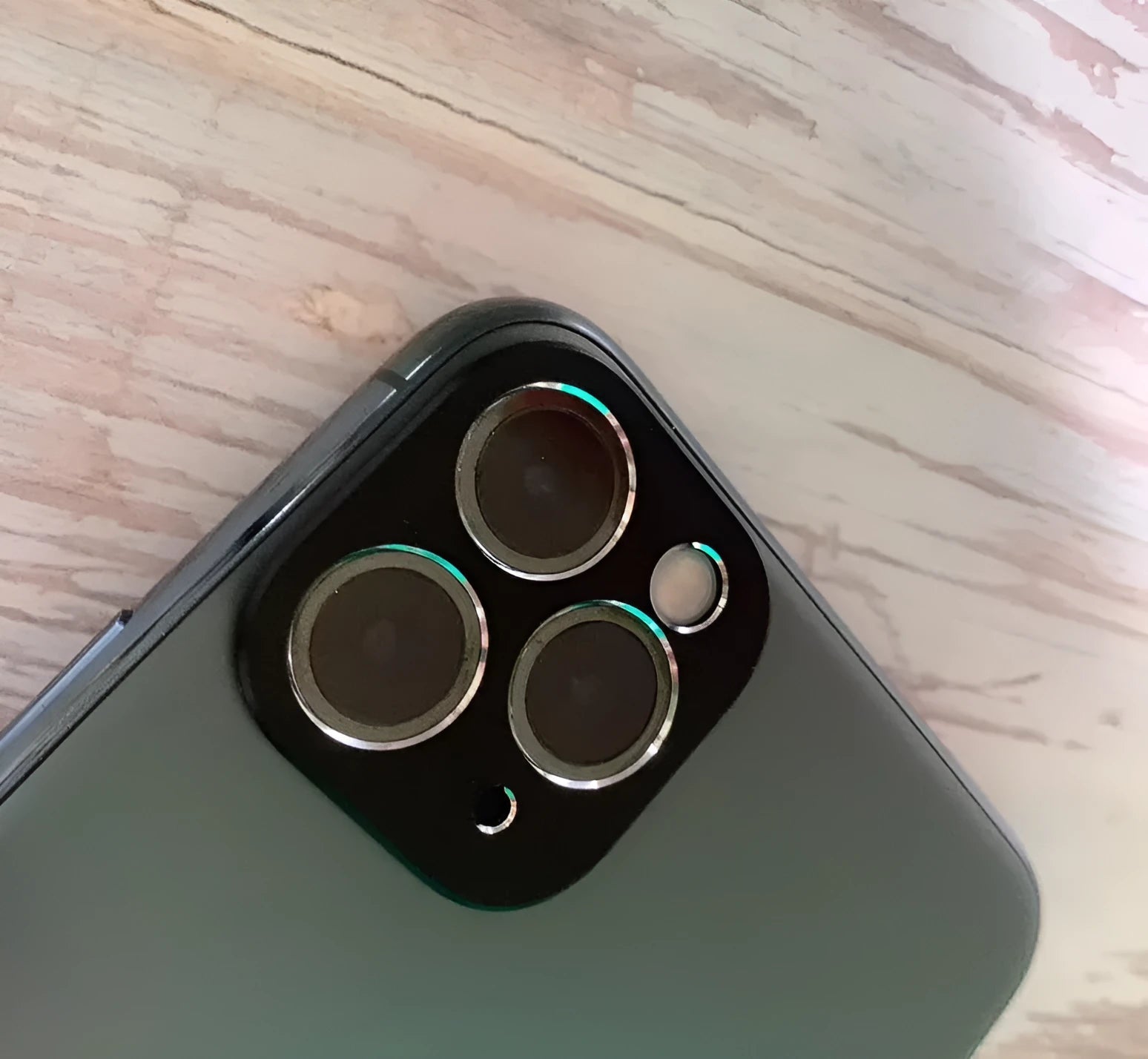 Metal camera lens protection ring for Apple iPhone 11 and iPhone 11 Pro models.