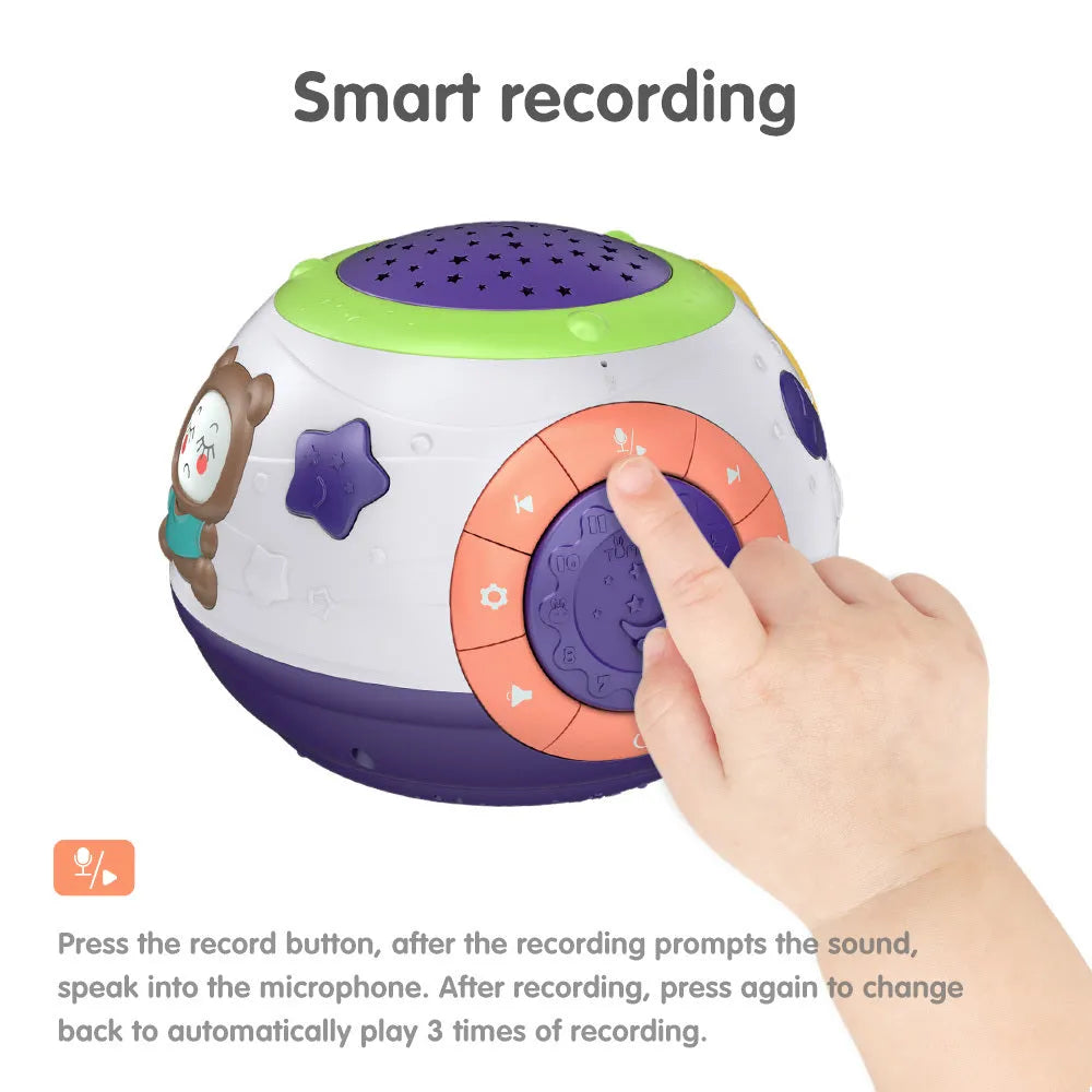 White plastic starry sky night light projector for children on a table.