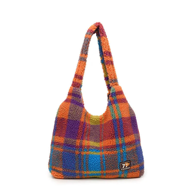 Women's plaid pattern plush crossbody tote bag showing interior zipper compartment and strap design