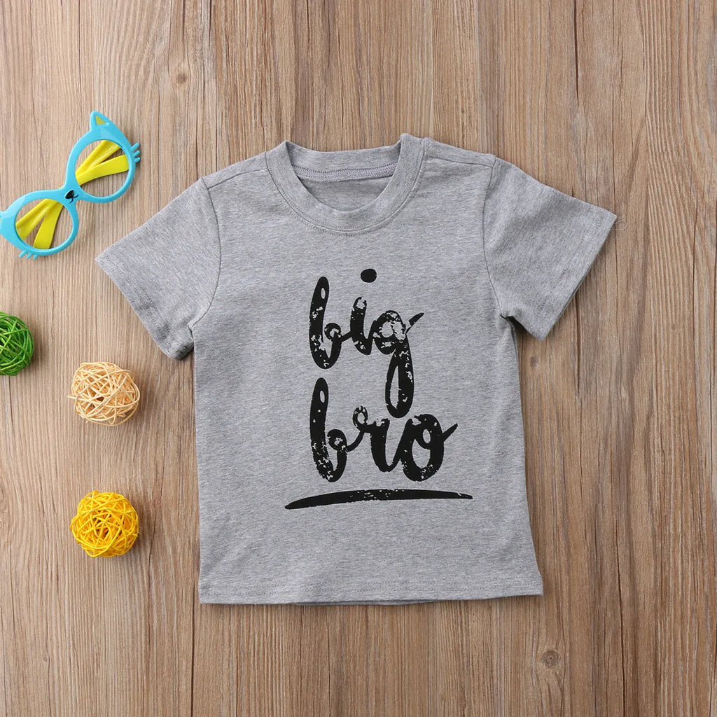 Grey printed cotton t-shirt shown in sizes for children and adults.