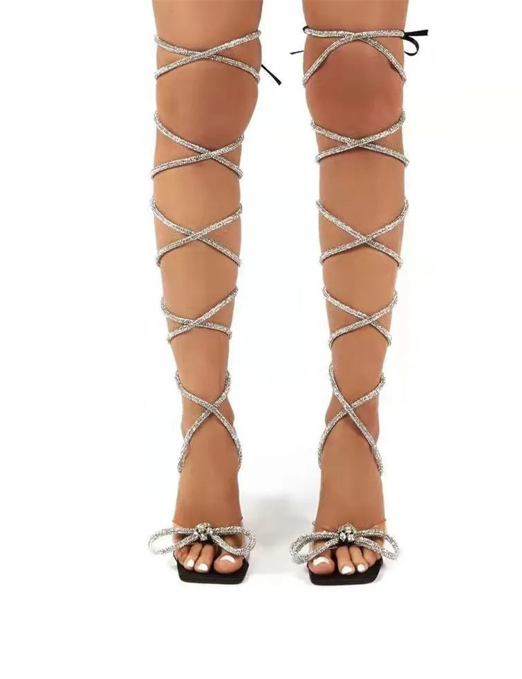 Plus size women's black strappy sandals with Roman rhinestone details and square toe design