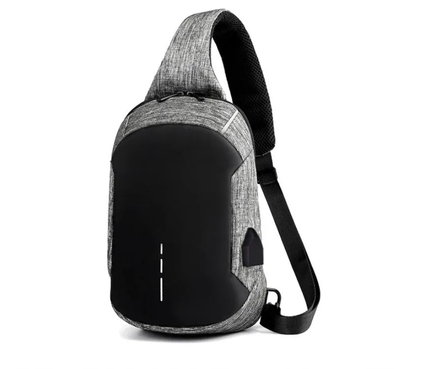 Dark blue Oxford cloth chest bag with adjustable strap, shown open to reveal internal mobile phone pocket.