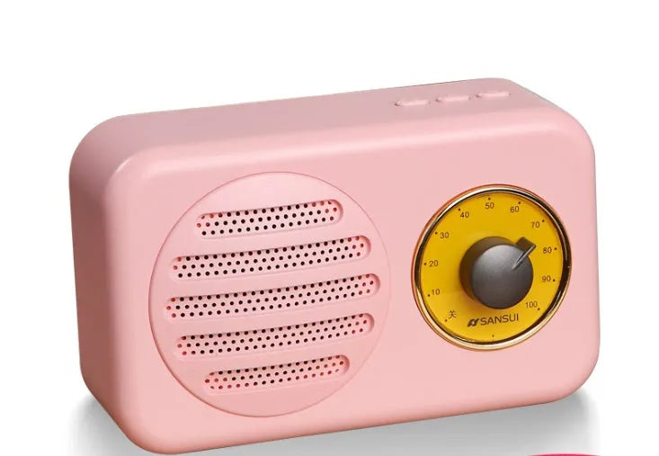 Portable Bluetooth speaker in wood grain finish with FM radio and micro USB cable