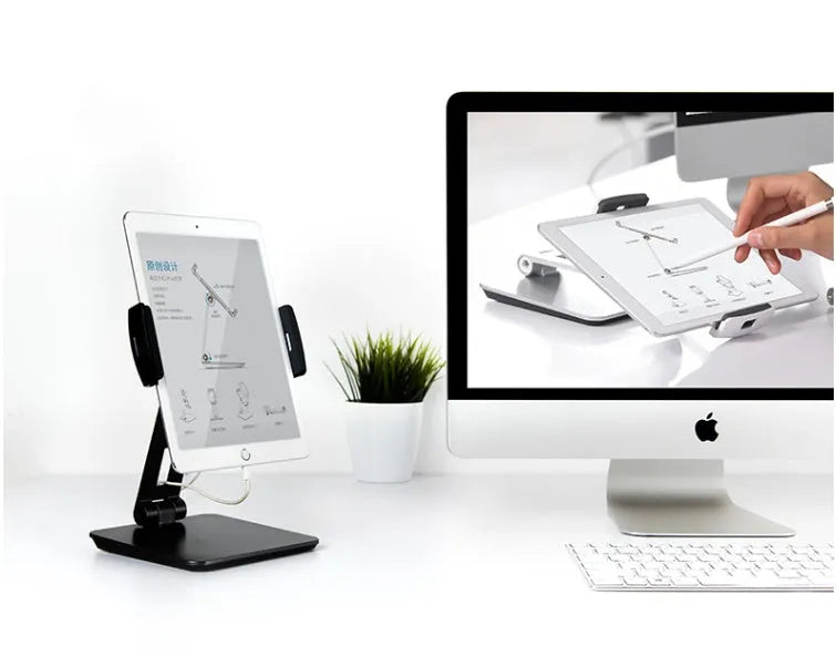 Foldable aluminium phone and tablet stand with black silicone protection showing 360-degree rotation capability