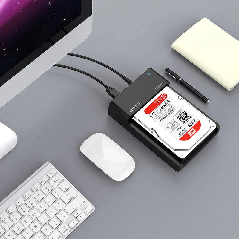 Black plastic hard disk box for 2.5-inch and 3.5-inch SATA drives with included data cable
