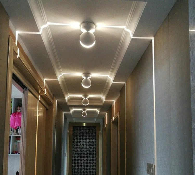Modern aluminium LED spotlight bar wall lamp available in multiple colours.