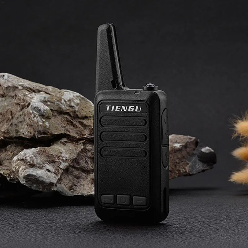 TIENGU black handheld two-way radio with antenna, LED flashlight, and back clip on a plain background