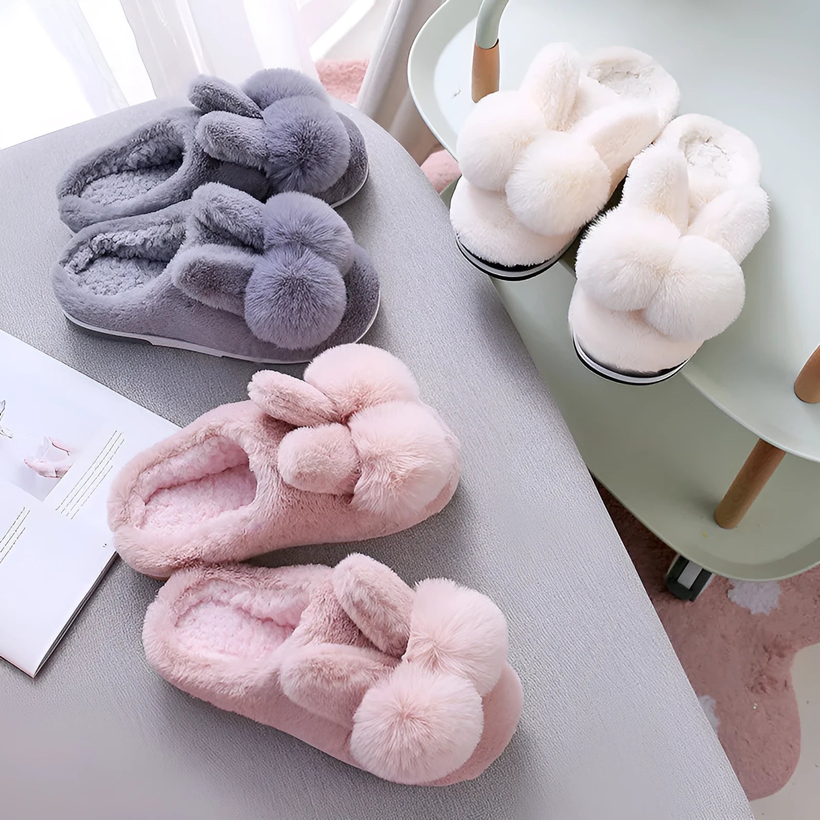 Women's fluffy rabbit fur slippers in pink, shown as slip-on winter shoes.