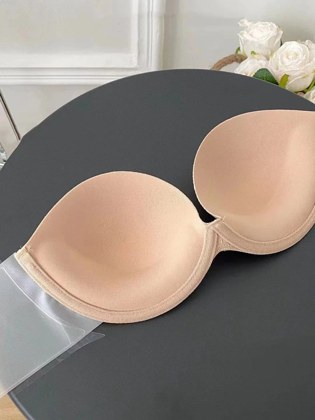 Strapless adhesive push up bra in skin colour with cotton lined mould cup and steel ring