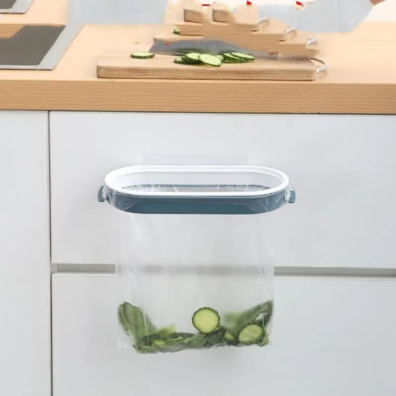 Blue plastic T-shaped kitchen garbage bag storage rack holding a roll of bin liners.