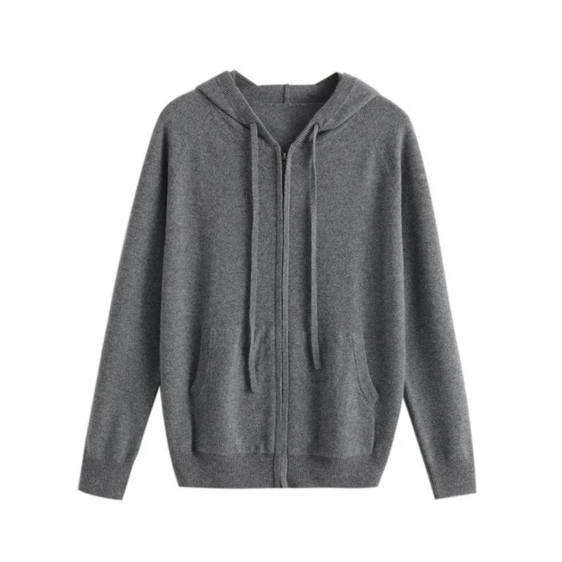 Man wearing a solid colour cashmere knitted cardigan with a zipper and hood.
