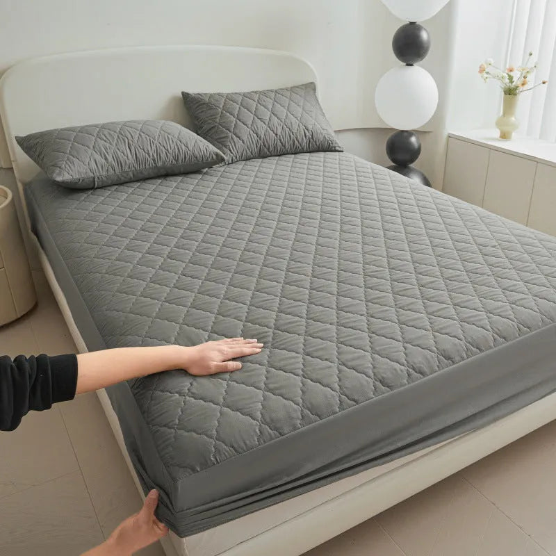 Diamond lattice quilted waterproof mattress protector set with bamboo fibre sheet and pillowcases for a 0.9m bed.