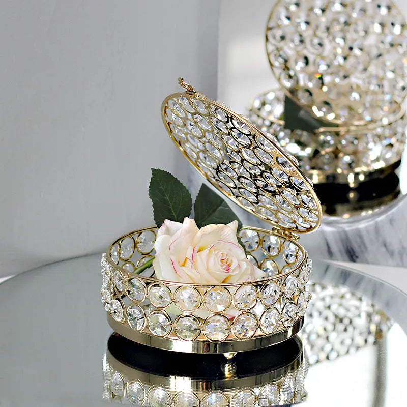 Clear crystal glass jewellery storage box with a French gold-coloured metal frame.