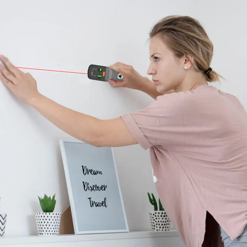 Red laser level with dust collection bracket, showing compact dimensions and built-in rechargeable battery.