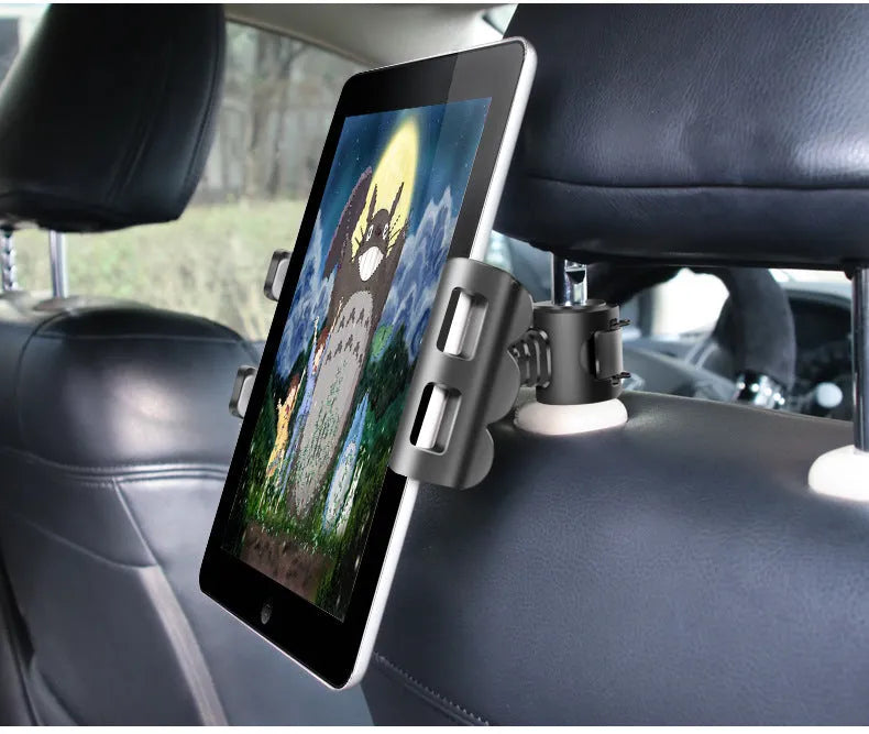 Black universal car headrest tablet holder mounted on a car seat, showing adjustable arm and 360-degree rotation.