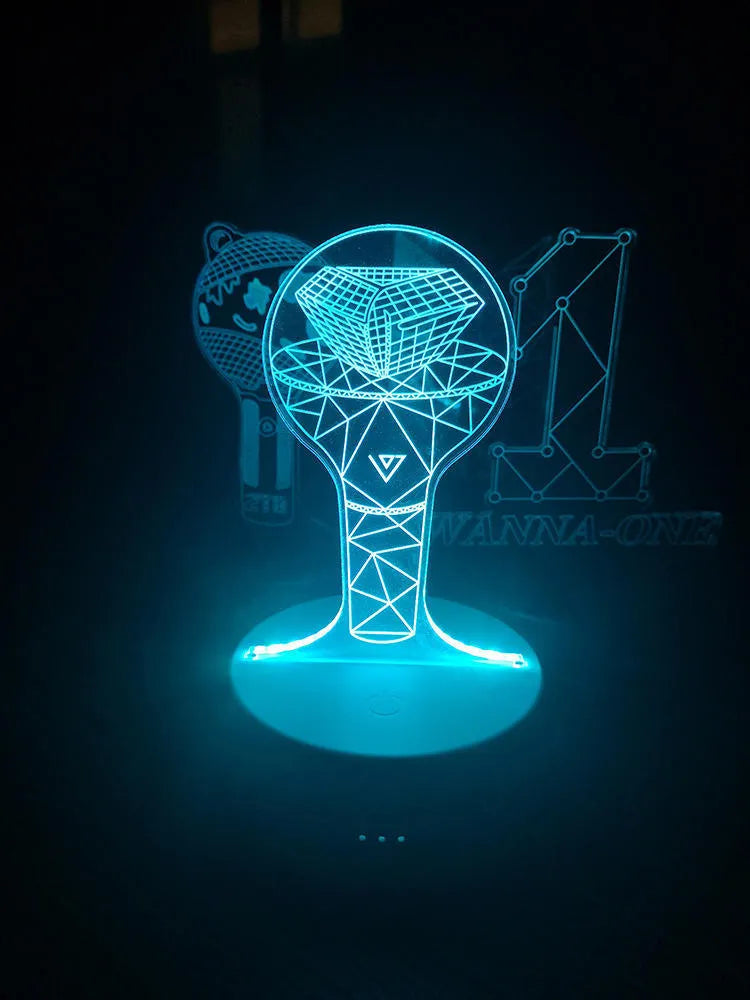Clear acrylic stand for BTS Light 101 BTS Tower Gem album display on a table.