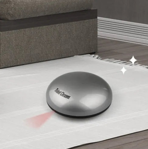 Silver-coloured mini robotic vacuum cleaner with compact dimensions for small space cleaning