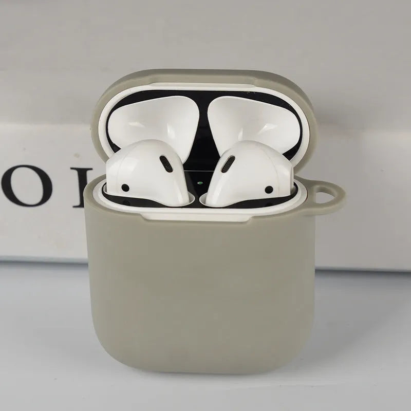 Soft silicone protective case for Bluetooth headphones in various colours on a grey background.