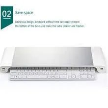 Smart aluminium and plastic computer monitor stand with USB charging ports and a hidden keyboard storage shelf