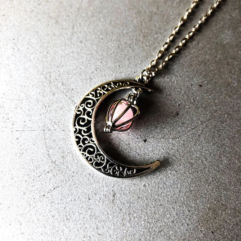 Alloy luminous pumpkin heart-shaped pendant necklace 50cm chain on display with glow effect