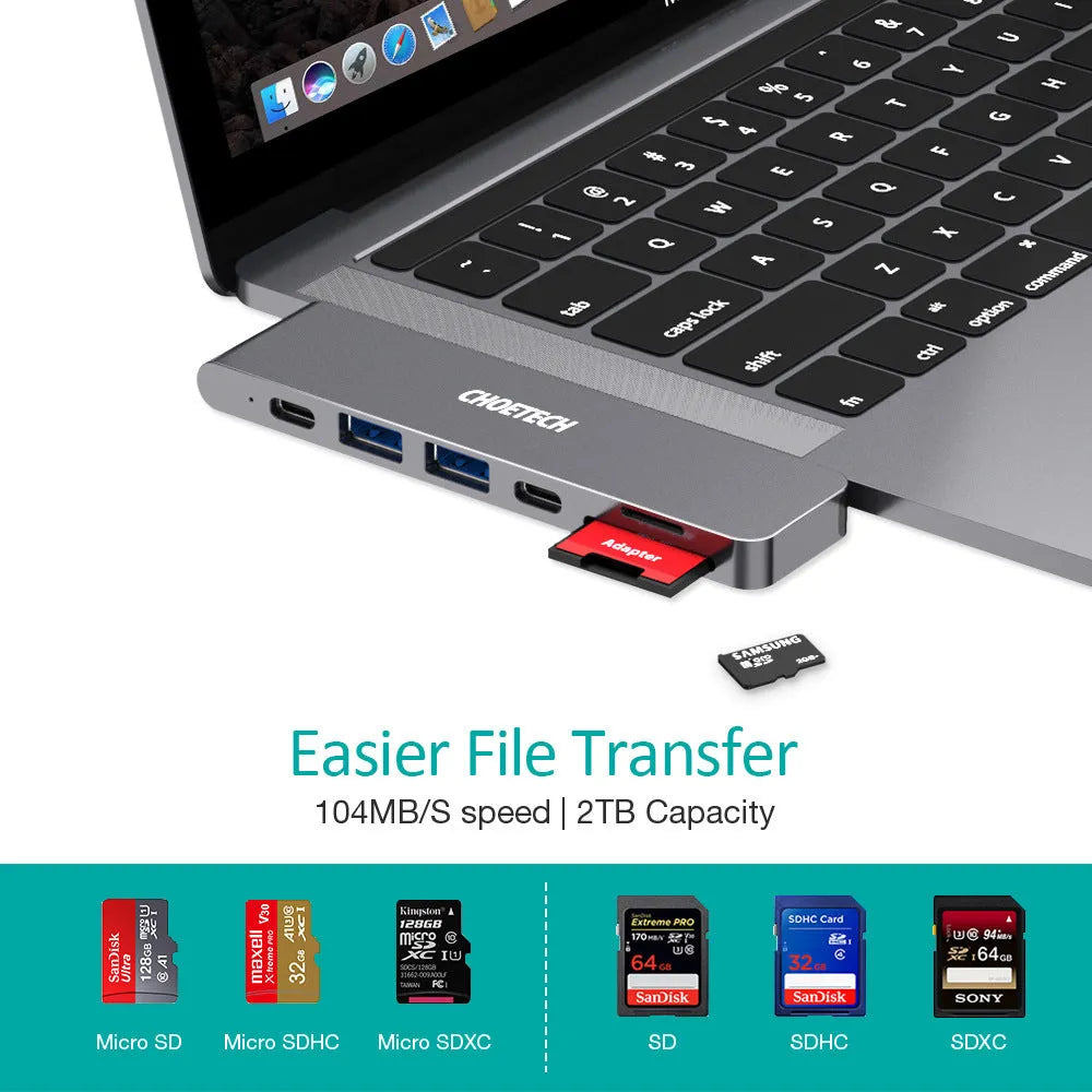 Silver aluminium USB C hub adapter with Thunderbolt 3, HDMI, SD card slots, and USB 3.0 ports