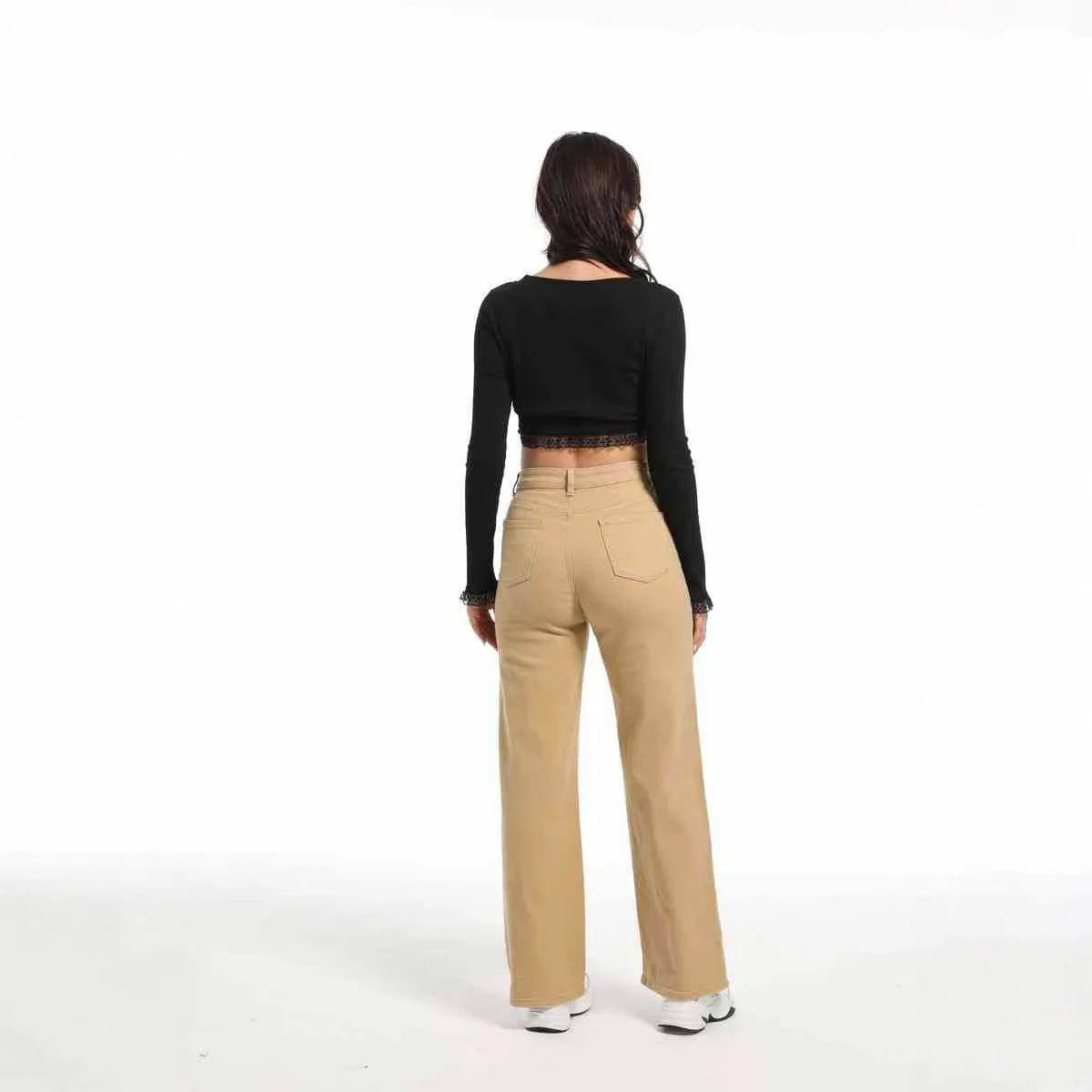 Women's high-waist straight leg jeans in apricot colour with a wide leg cut.
