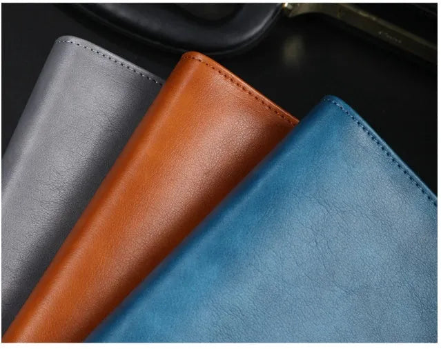 Hardcover A5 leather notebook with buckle closure in five colour options showing interior Daolin paper