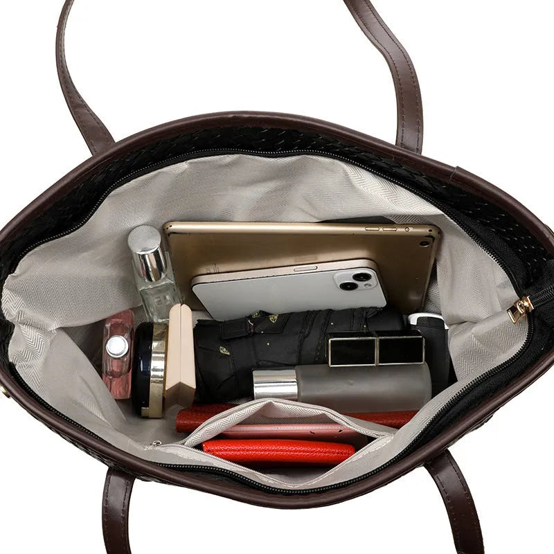 Retro women's large capacity commuter handbag in black or brown with sandwich pocket design