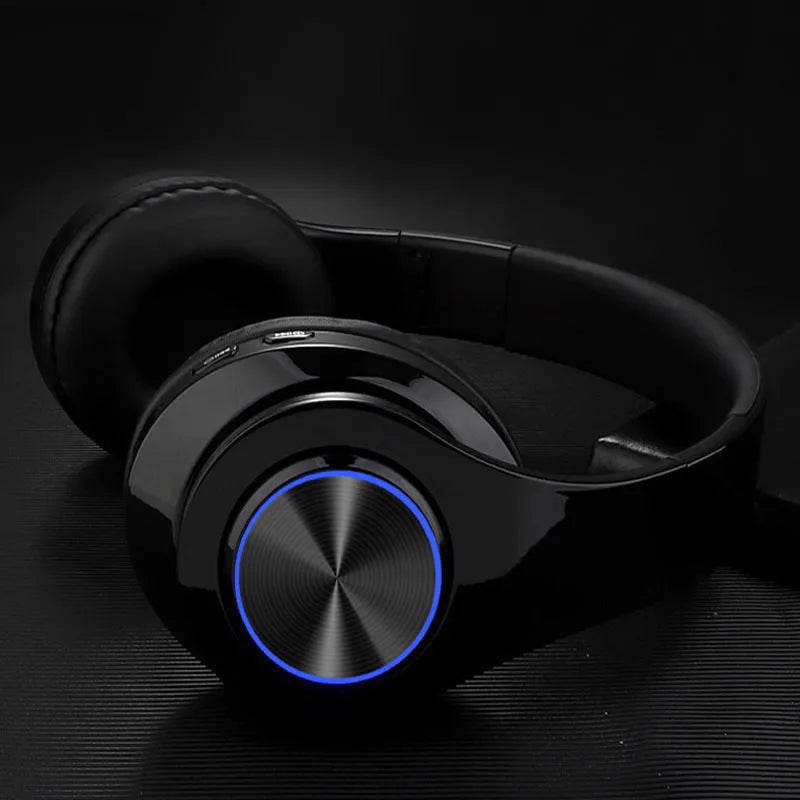 Wireless Bluetooth headset for mobile phones in red, black, blue, pink, or white colour.