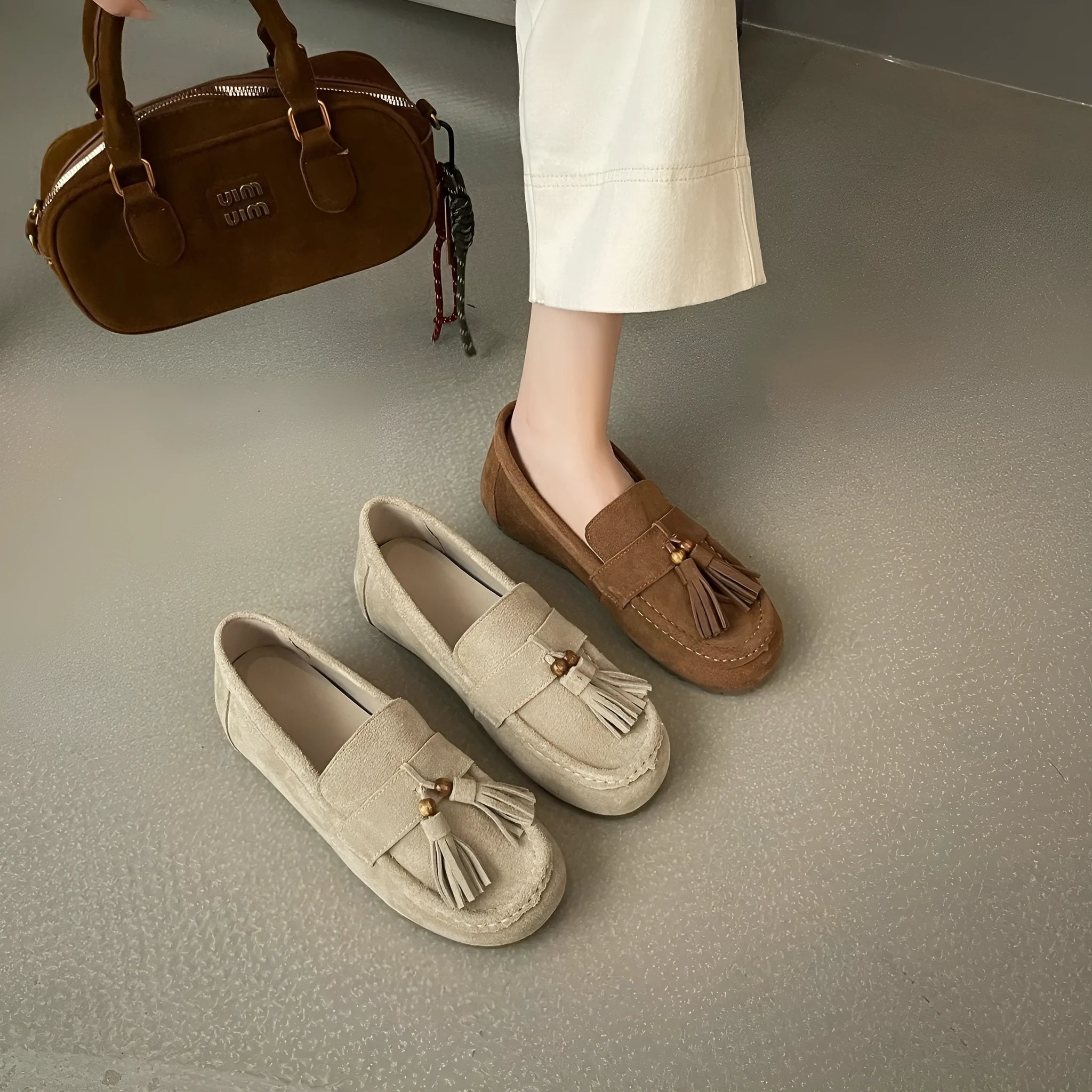 Women's inner height increasing slip-on tassel flats in brown with suede leather upper and round toe