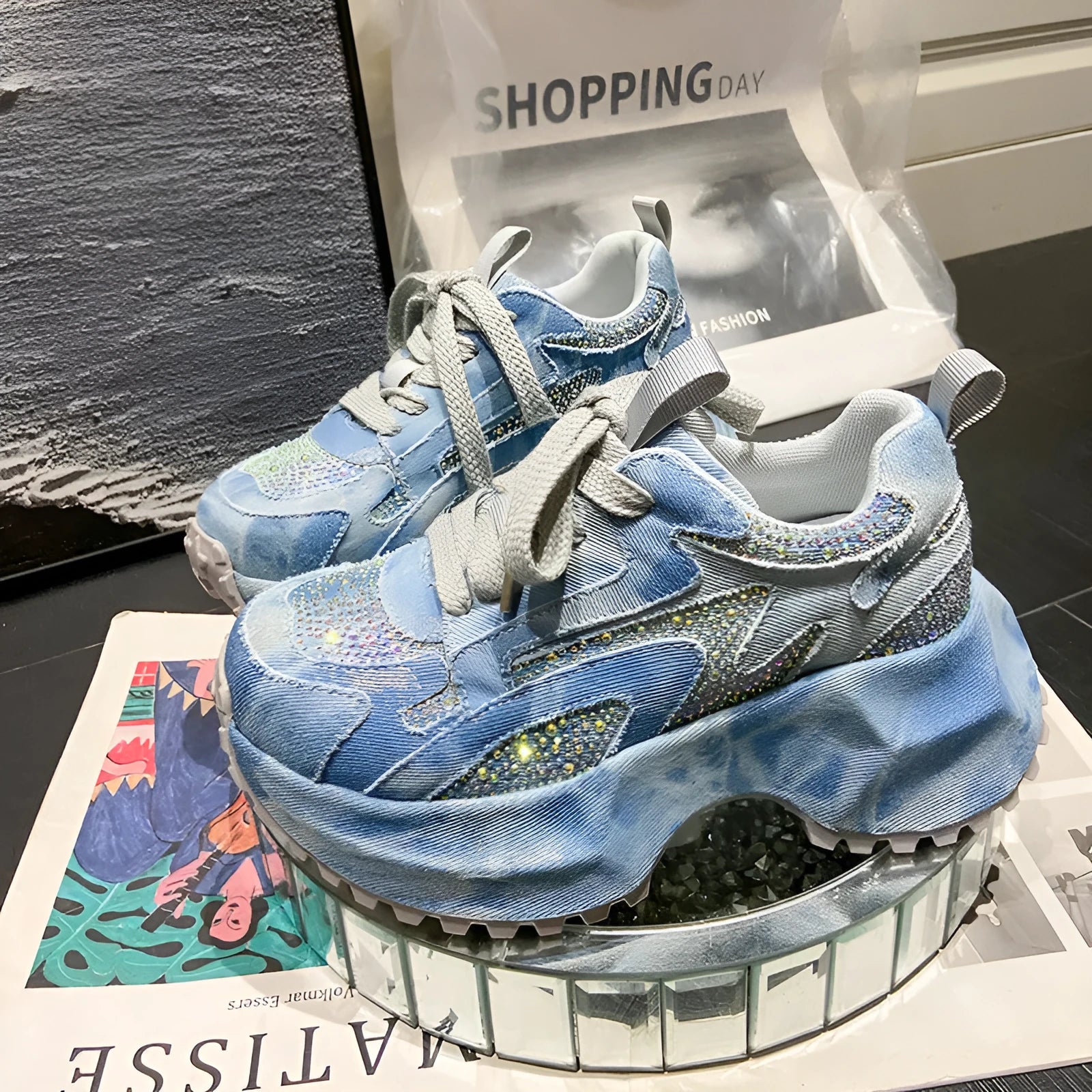 Blue white gradient denim high top platform sneakers with rhinestone embellishment, lace-up front, thick rubber sole
