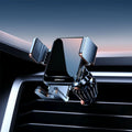 Black car wireless charging bracket with automatic opening mechanism mounted on car vent