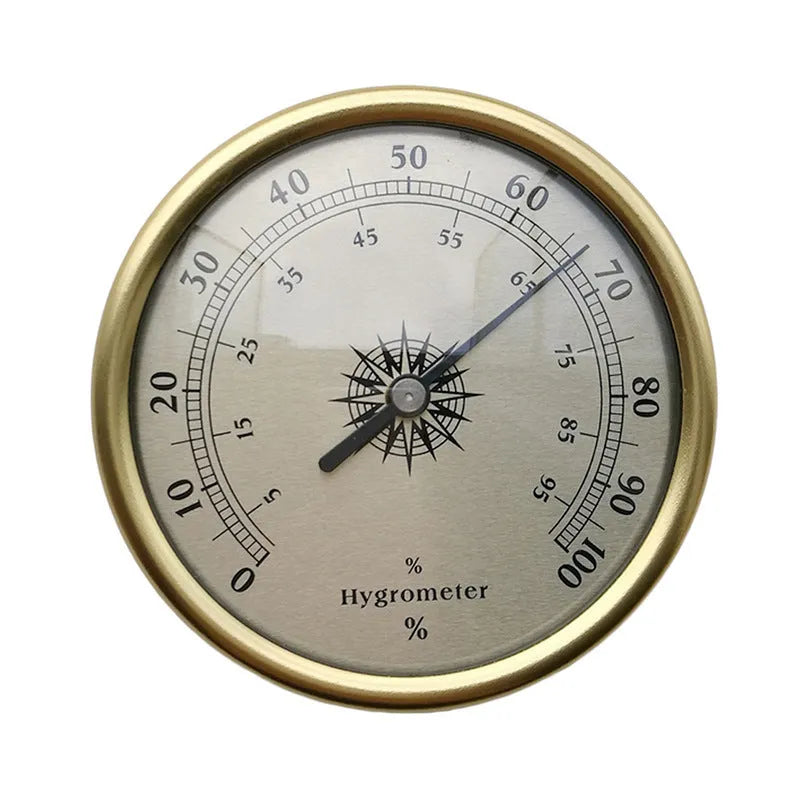 Analogue thermometer and hygrometer with aluminium dial on white background