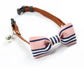 Pet tie in Blue Lattices pattern on a small dog wearing a collar