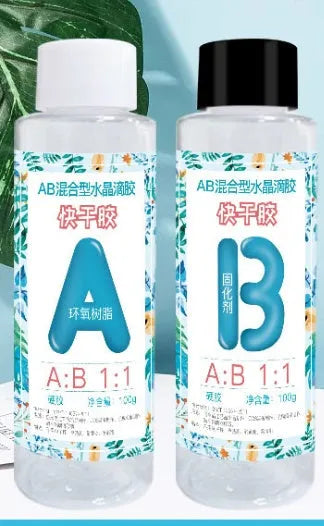 Two bottles of quick-curing AB epoxy resin for DIY jewellery making, 100g and 200g sizes.