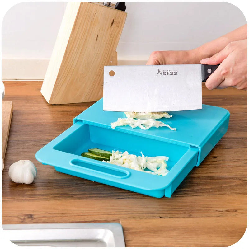 Blue kitchen chopping board with integrated drain basket for vegetable and meat preparation