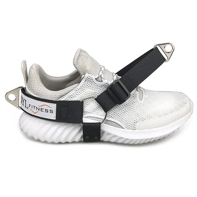 Black ankle buckle leg strength strap tension booties with gantry frame and suspender buckles for climbing.
