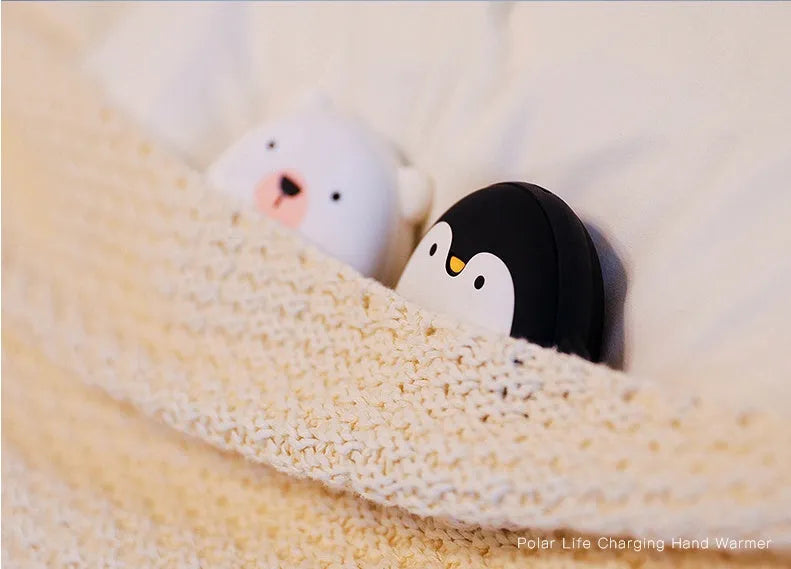 Cartoon penguin polar bear USB rechargeable hand warmer power bank showing black, white, and white-black colour options