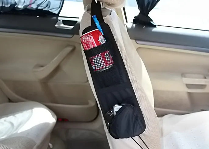 Black nylon car chair side bag with compartments for drinks and phone, attached to vehicle seat