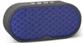 Portable grey Bluetooth wireless speaker with subwoofer and HD microphone on a table.