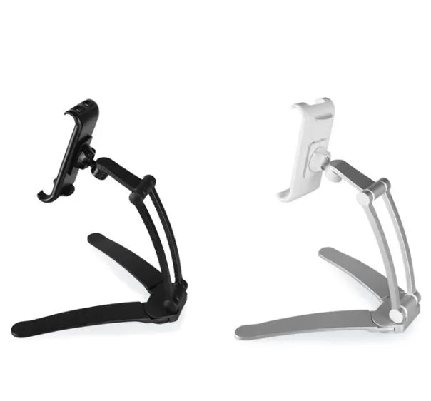 Silver aluminium desktop stand holding a tablet, showing 360-degree rotation and adjustable clamp mechanism.