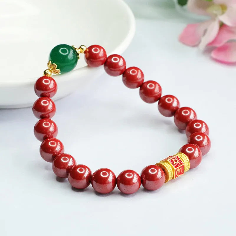 Emperor Sandstone colour cinnabar bracelet with 8mm beads and a six words motto charm.