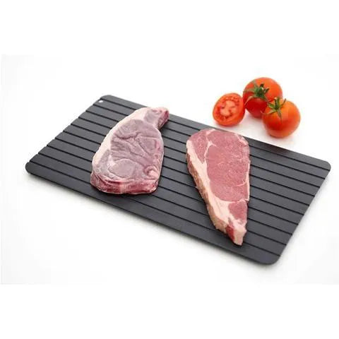 Black aluminium defrosting tray for thawing frozen meat without microwave
